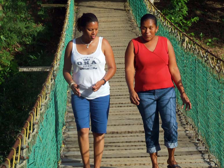 Marva and Carla walking the bridge outside of Hattieville Jungle